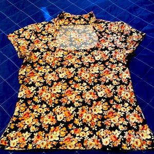 Super cute top.  Perfect condition.  Doesn’t fit anymore.